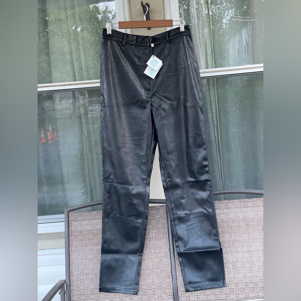 Black “leather” pants. Size: L.